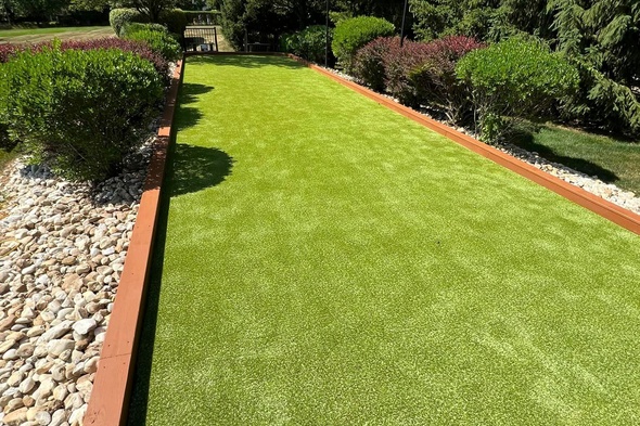 Greenwich Bocce Ball Court featuring artificial grass